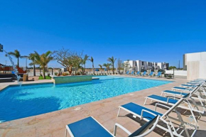 Stylish Townhome with Pool, Patio, and Secure Parking